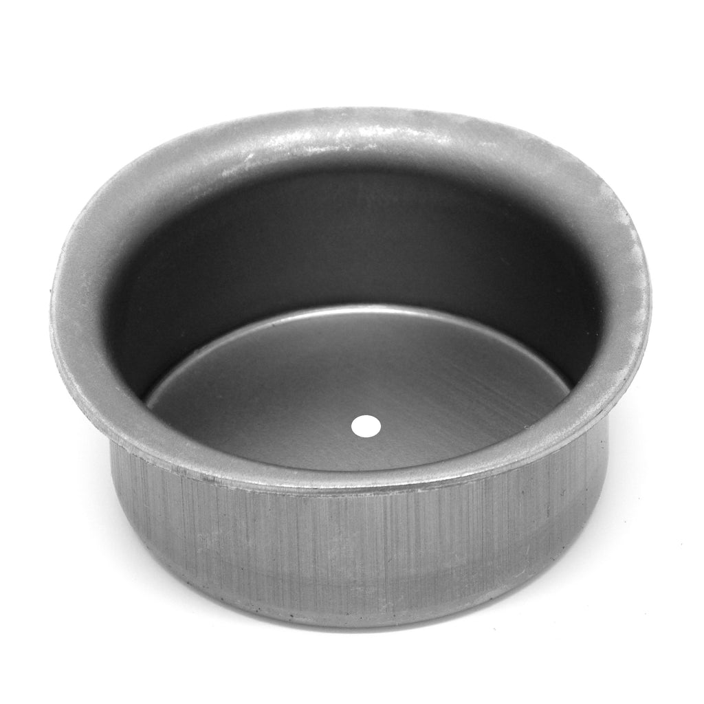 A tea light holder with a punched hole to connect to steel