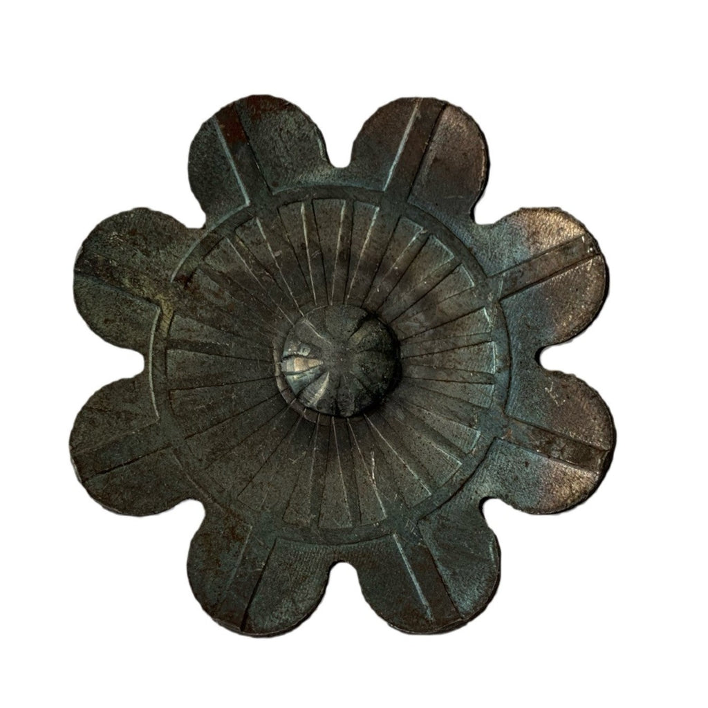 A cast Steel Rosette with a stalk ideal for wrought iron work