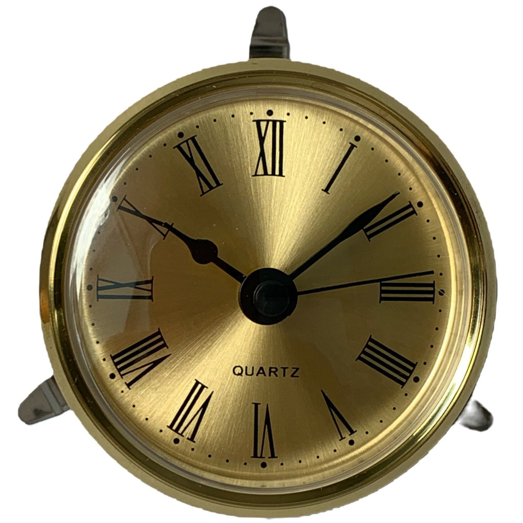 A round Craft Clock Insert with a gold dial - 65mm in diameter