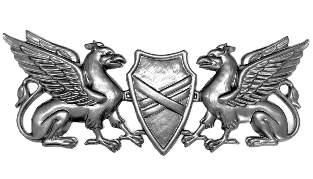 A griffin and shield made from thin metal -awesome as a focal point to craft ideas