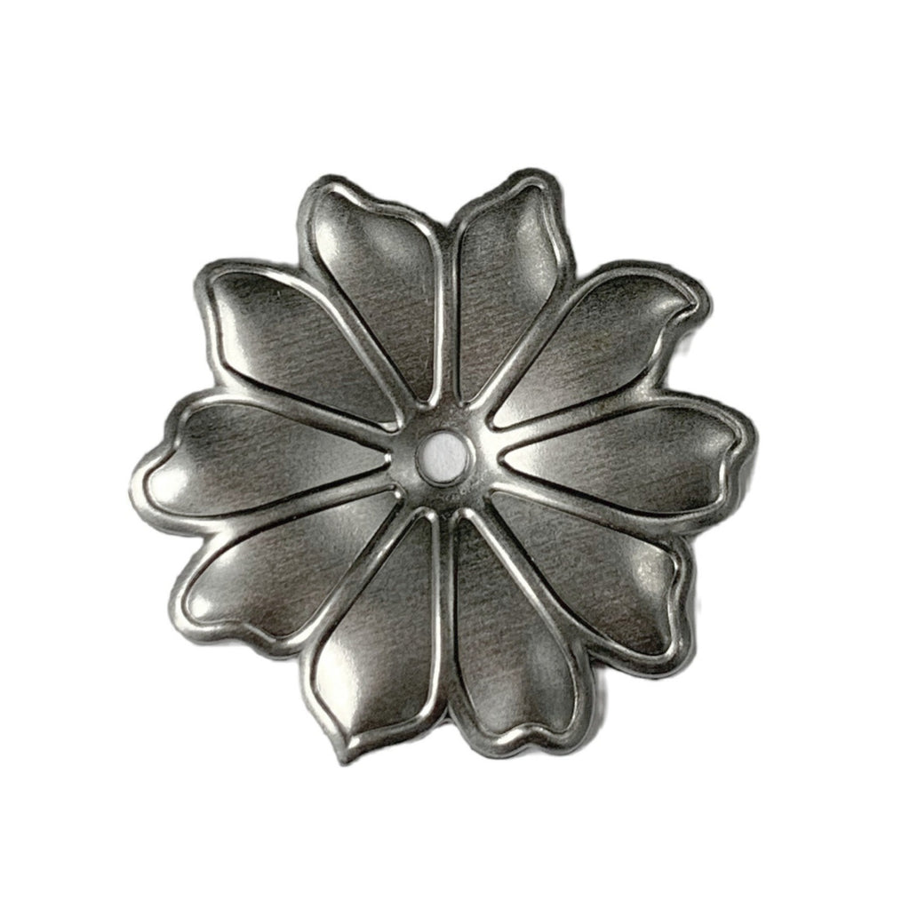 This flower candle tray holder has a textured pattern