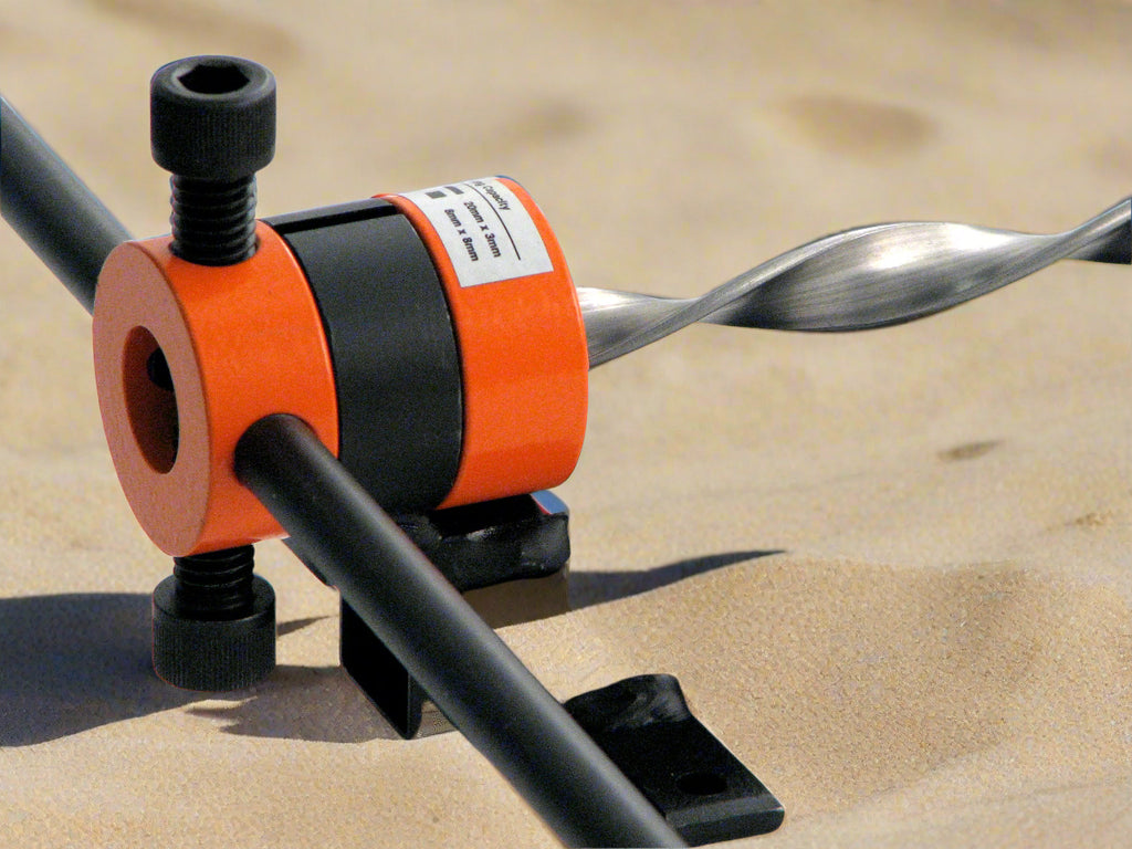 slotted adaptor to twist metal that may already have scrolls in
